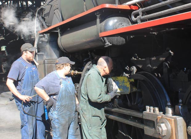 volunteers working at the NNRY workshop