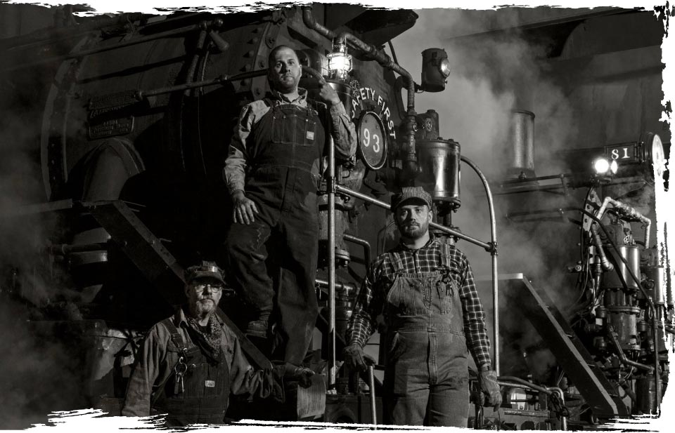 NNRY employees standing on top of train